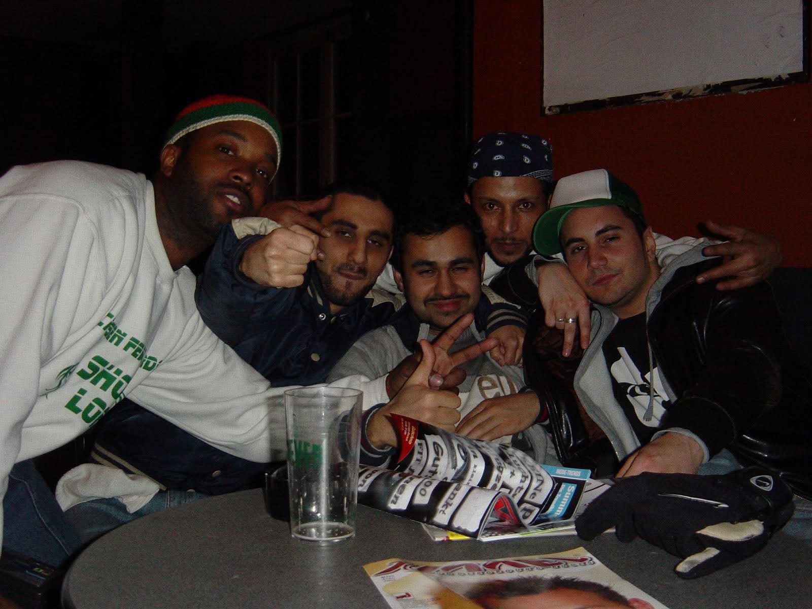 DJ Farhot, Maskoe, Adopekid, Kumai and Shortlord around the table — Shortlord on the right