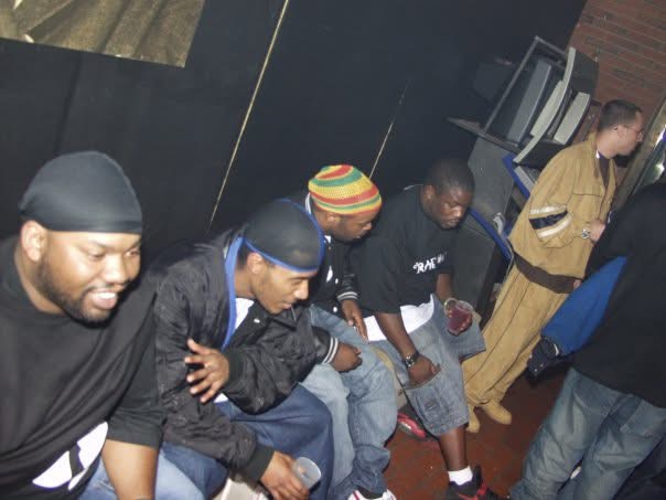 Raekwon of Wu-Tang Clan with DJ Madman, Shortlord of Chosenfew, and Raekwon’s manager on stage